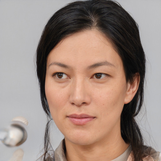 Neutral white adult female with medium  brown hair and brown eyes