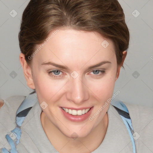 Joyful white young-adult female with medium  brown hair and blue eyes