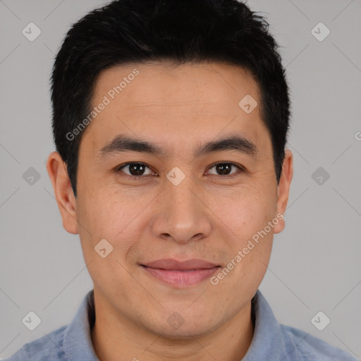 Joyful latino young-adult male with short  brown hair and brown eyes