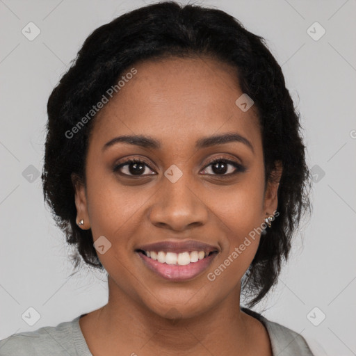 Joyful black young-adult female with medium  black hair and brown eyes