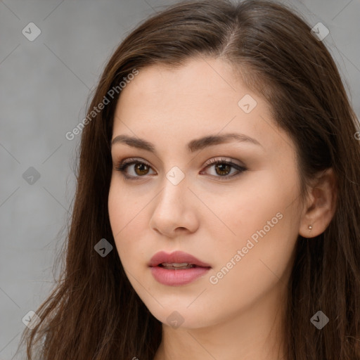 Neutral white young-adult female with long  brown hair and brown eyes