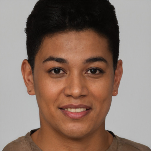 Joyful latino young-adult female with short  brown hair and brown eyes