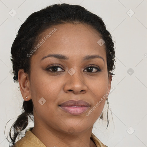 Joyful black young-adult female with medium  brown hair and brown eyes
