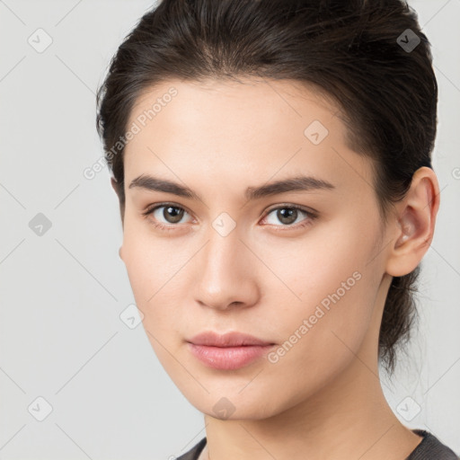 Neutral white young-adult female with medium  brown hair and brown eyes