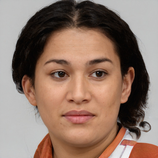 Joyful white young-adult female with medium  brown hair and brown eyes