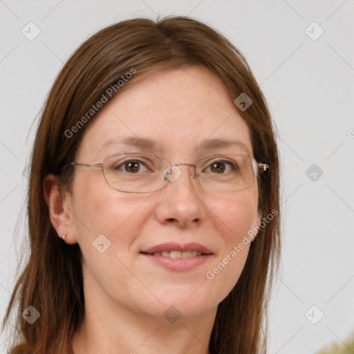 Joyful white adult female with long  brown hair and brown eyes