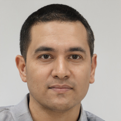 Neutral white young-adult male with short  black hair and brown eyes