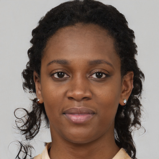Neutral black young-adult female with long  black hair and brown eyes
