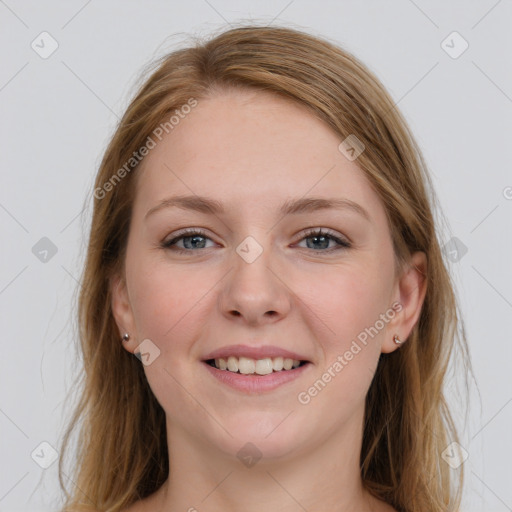 Joyful white young-adult female with long  brown hair and grey eyes