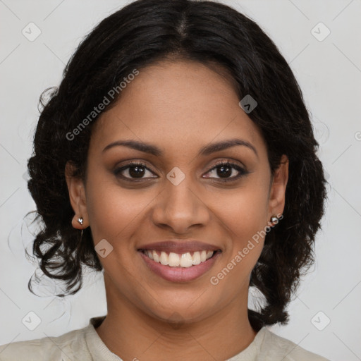 Joyful black young-adult female with medium  brown hair and brown eyes