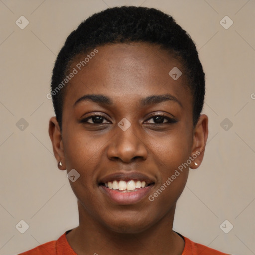 Joyful black young-adult female with short  black hair and brown eyes