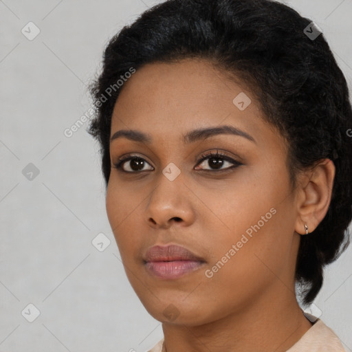 Neutral black young-adult female with short  black hair and brown eyes