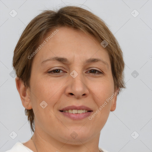 Joyful white adult female with short  brown hair and brown eyes