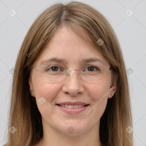 Joyful white adult female with long  brown hair and grey eyes