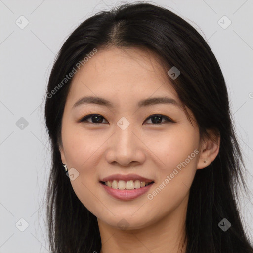 Joyful asian young-adult female with long  brown hair and brown eyes