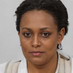 Neutral black young-adult female with short  brown hair and brown eyes