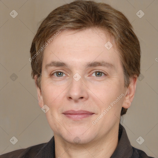 Joyful white adult male with short  brown hair and grey eyes