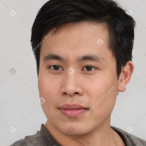 Neutral asian young-adult male with short  brown hair and brown eyes