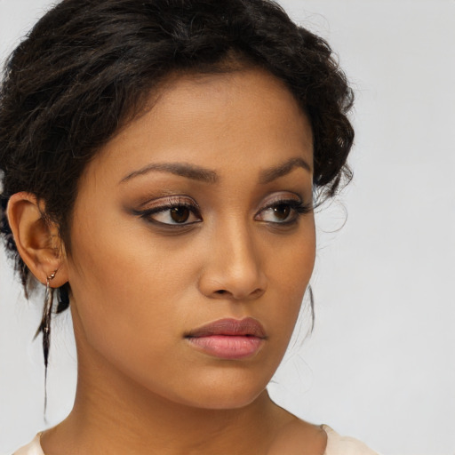 Neutral latino young-adult female with medium  brown hair and brown eyes