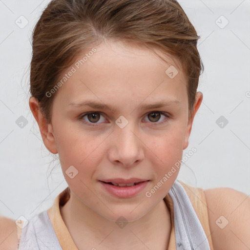 Joyful white child female with short  brown hair and brown eyes