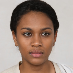 Neutral black young-adult female with short  black hair and brown eyes