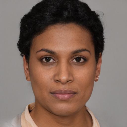Neutral black young-adult female with short  black hair and brown eyes