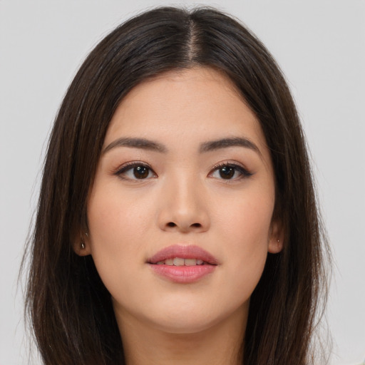 Neutral asian young-adult female with long  brown hair and brown eyes