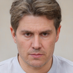 Neutral white adult male with short  brown hair and brown eyes