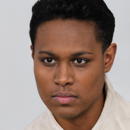 Neutral black young-adult female with short  brown hair and brown eyes