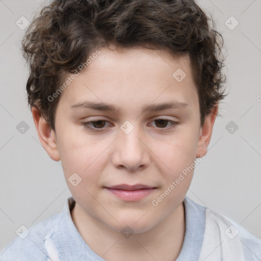 Joyful white child male with short  brown hair and brown eyes