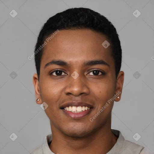 Joyful black young-adult male with short  black hair and brown eyes