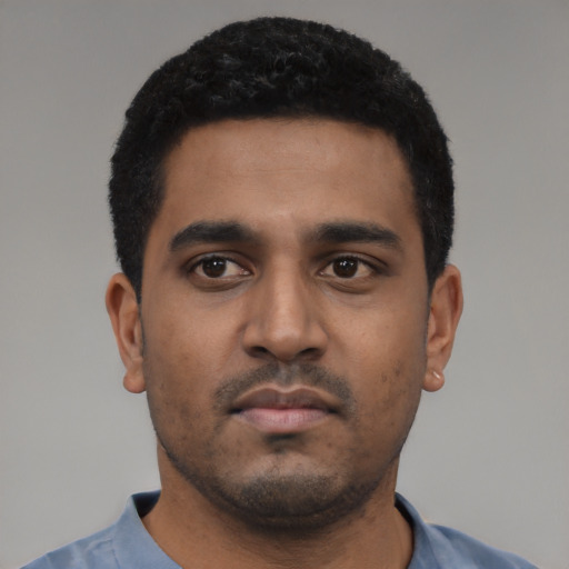Neutral black young-adult male with short  black hair and brown eyes