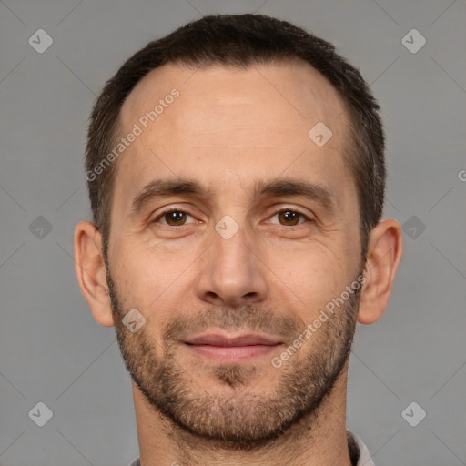 Joyful white adult male with short  brown hair and brown eyes