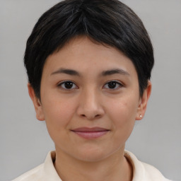 Joyful asian young-adult female with short  brown hair and brown eyes