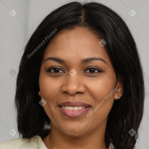 Joyful latino young-adult female with long  black hair and brown eyes