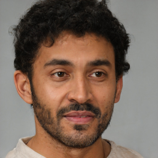Neutral latino young-adult male with short  brown hair and brown eyes