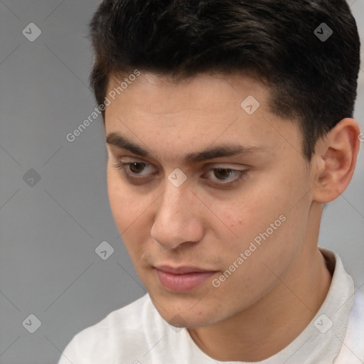 Neutral white young-adult male with short  brown hair and brown eyes