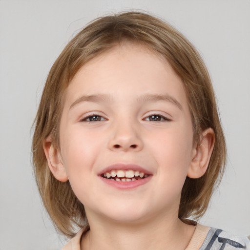 Joyful white child female with medium  brown hair and brown eyes