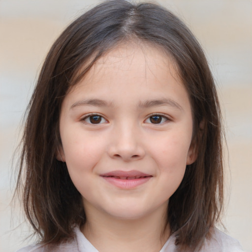 Joyful white child female with medium  brown hair and brown eyes