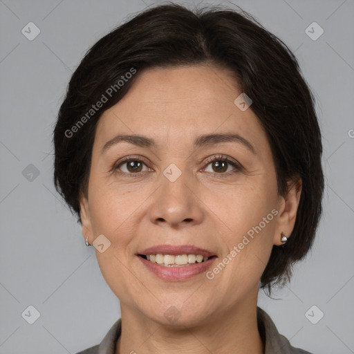 Joyful white adult female with medium  brown hair and brown eyes