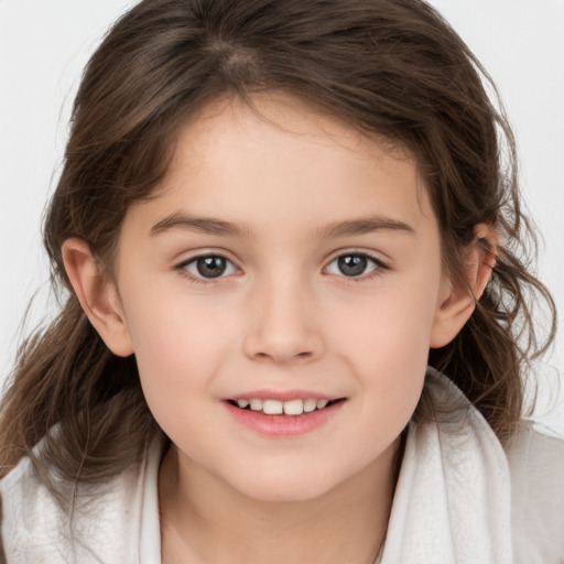 Joyful white child female with medium  brown hair and brown eyes