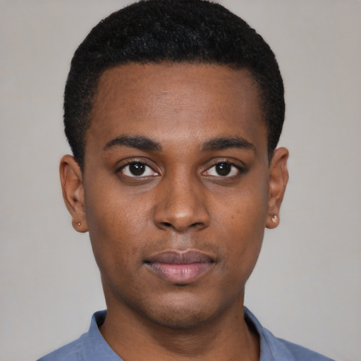 Neutral black young-adult male with short  black hair and brown eyes