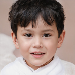 Joyful white child male with short  brown hair and brown eyes