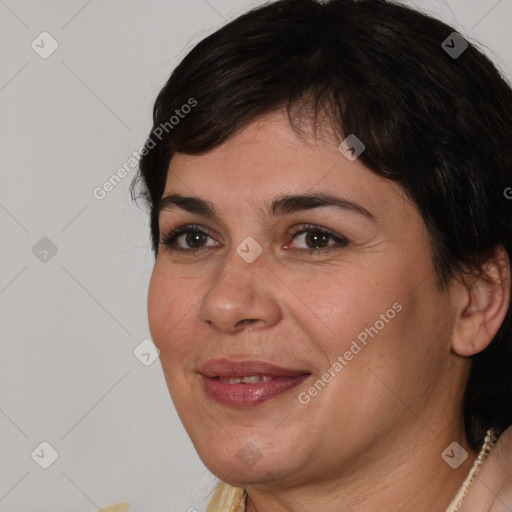 Joyful white adult female with short  brown hair and brown eyes