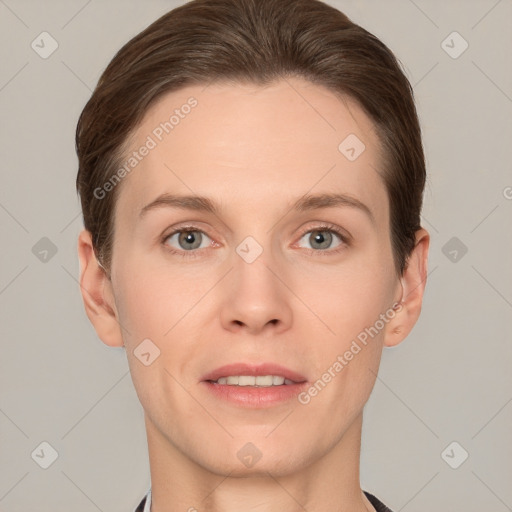 Joyful white young-adult female with short  brown hair and grey eyes