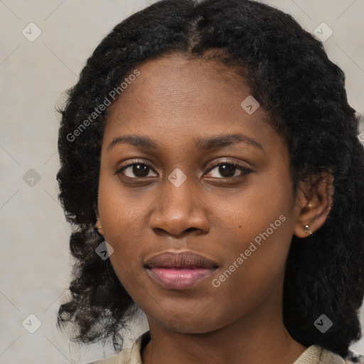 Joyful black young-adult female with medium  black hair and brown eyes