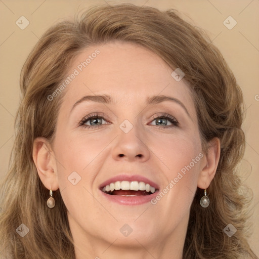 Joyful white young-adult female with long  brown hair and grey eyes