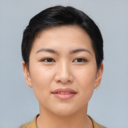 Joyful asian young-adult female with short  brown hair and brown eyes