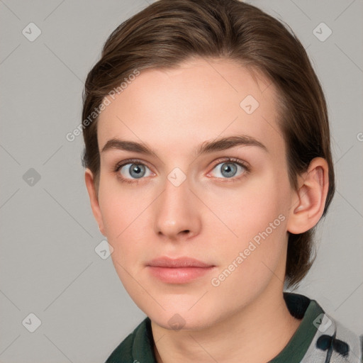 Neutral white young-adult female with medium  brown hair and grey eyes