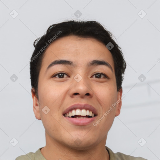 Joyful asian young-adult male with short  brown hair and brown eyes